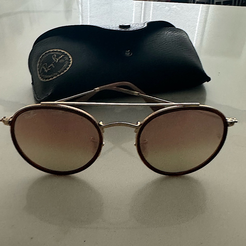 Ray-Ban Sunglasses. Gold rims. Gently worn